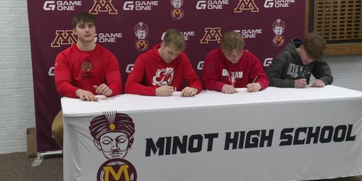 Four Minot High football players sign on Wednesday